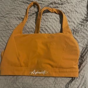 Alphalete pulse kinetic orange sport bra
